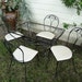 Salterini wrought iron dining set in the laurel leaf pattern
