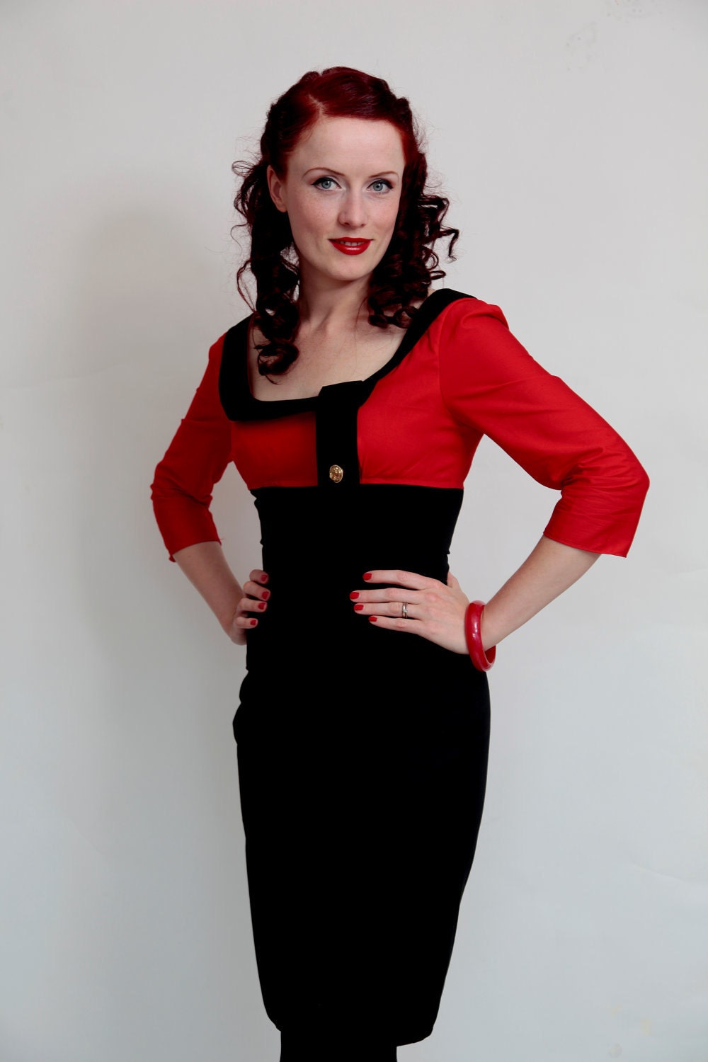 1950s inspired bombshell dress in black navy red and white