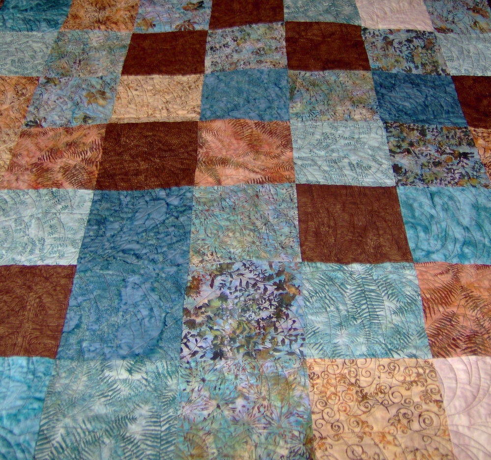 lap-quilt-brown-and-blue-traditional-patchwork-quilt-hoffman