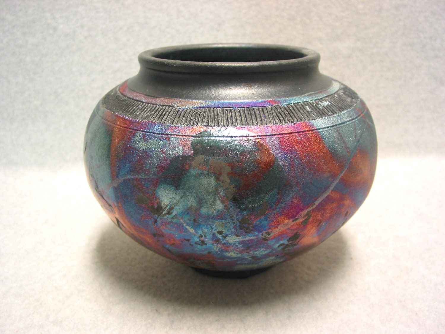  Raku Pot with Carved Design