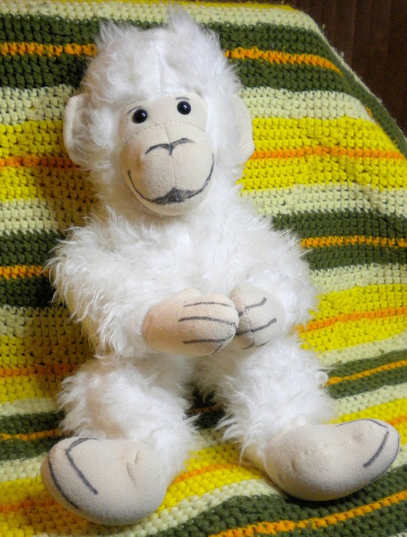 white stuffed monkey