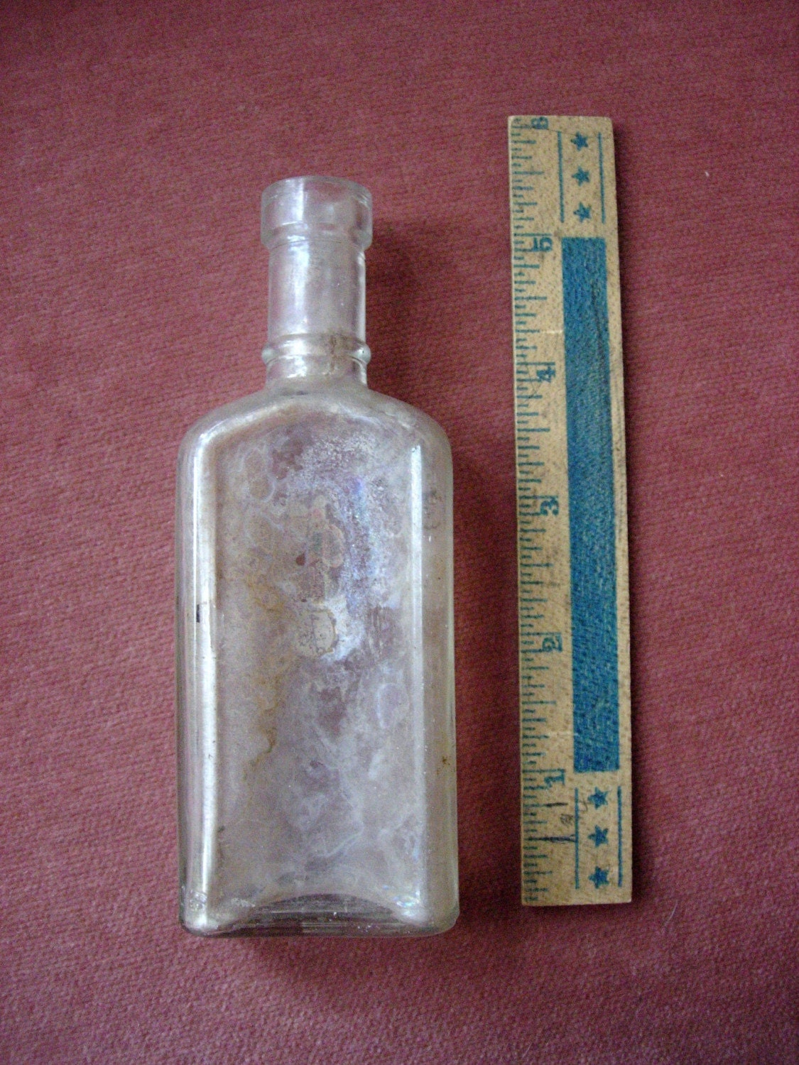 Download Very old clear glass bottle small made for a cork