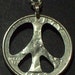 Reserved for Steve (peace sign in a half-dollar)