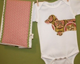 Dachshund bodysuit and burp cloth gift set in star paisley and pink honeycomb prints