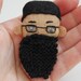 long black beard brooch face with black spectacles and hair