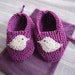 Purple spring time hand knit booties with cute vintage Laura Ashley lilac little bird appliques and matching gift bag