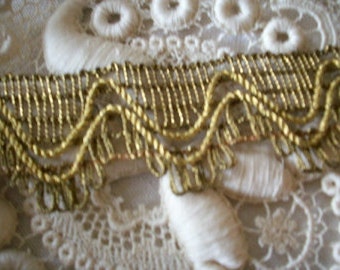 1 yard of high metal content antique gold trim, old store stock,more avail.