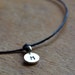 Make a Wish bracelet with Sterling SIlver TINY personalized hand stamped initial on black waxed Irish linen cord
