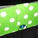 Green and white duct tape coupon organizer