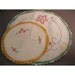 SALE - 2 vintage linen doilies with crocheted trim and cross stitch flowers