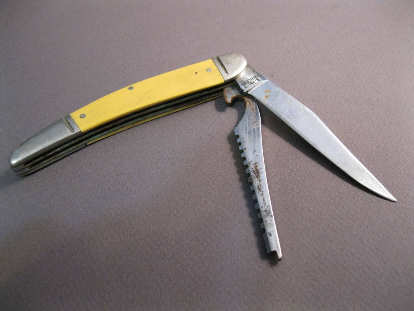 vintage WESTERN pocket knife stainless steel yellow handle