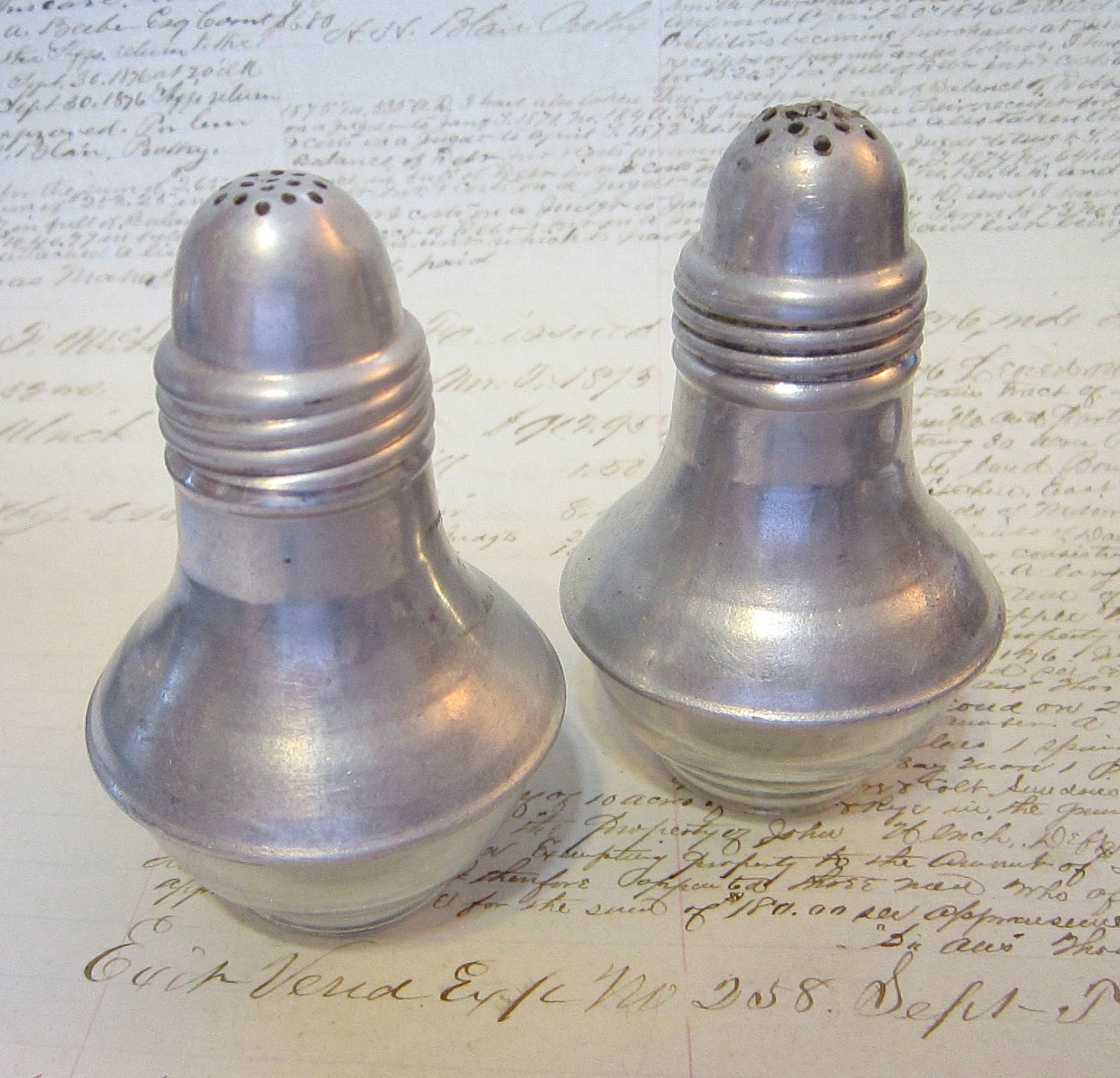 vintage salt and pepper shakers glass and aluminum