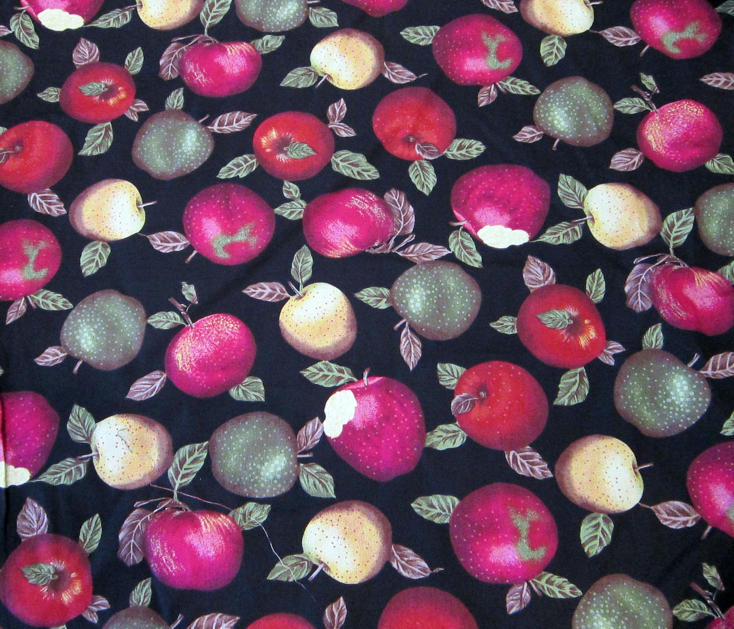 fabric APPLE pattern on black background 100% by theartfloozy