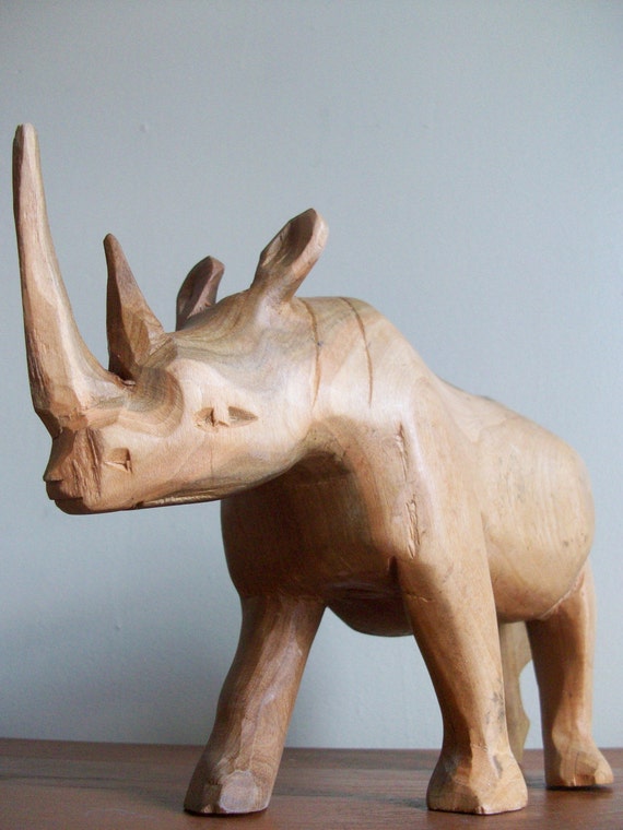 wooden rhino statue