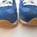 nike white shoes blue swoosh