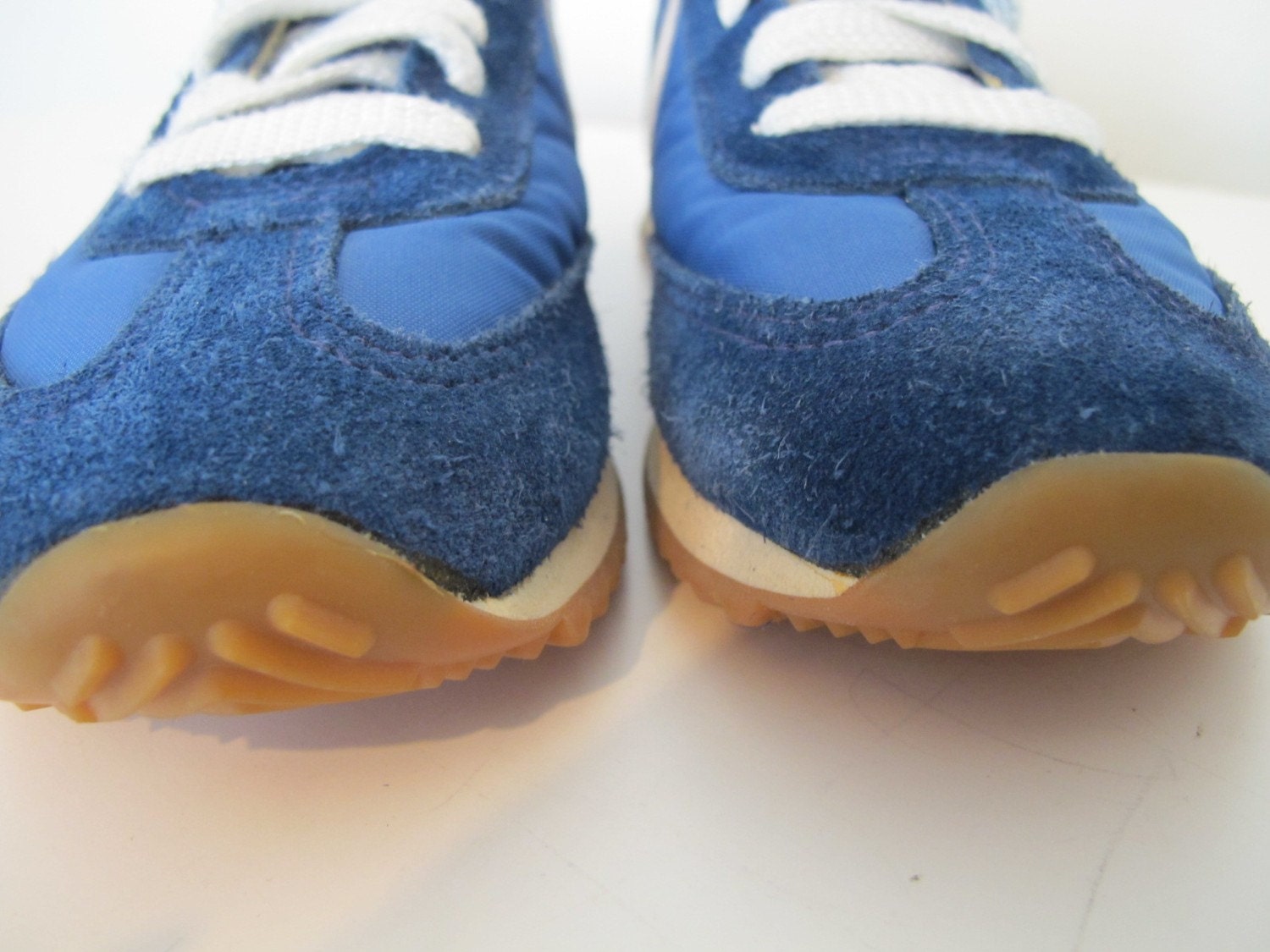 nike white shoes blue swoosh