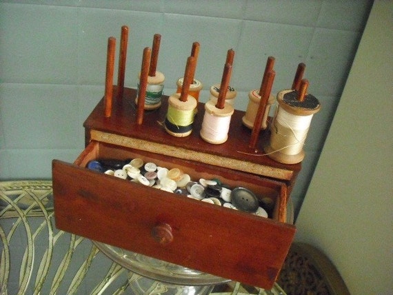 Vintage wood thread reel holder with vintage spools of thread