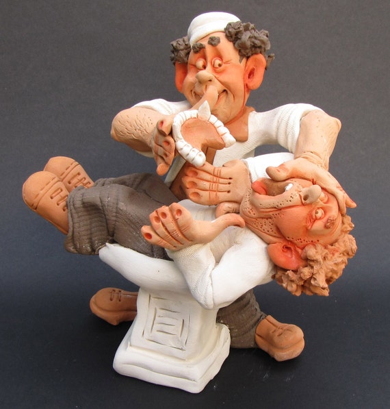 Dentist with the Artificial Jaw