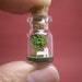 Tiny green tree and a couple in a tiny bottle ver.2
