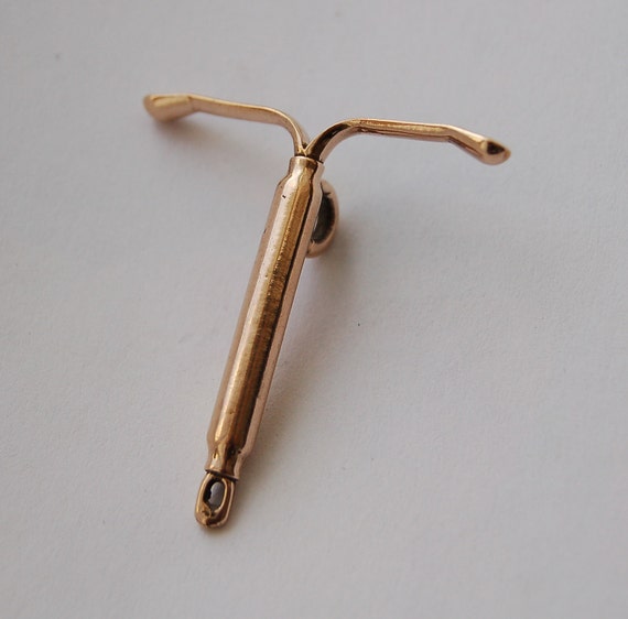 Items similar to Bronze IUD Pendant on Etsy