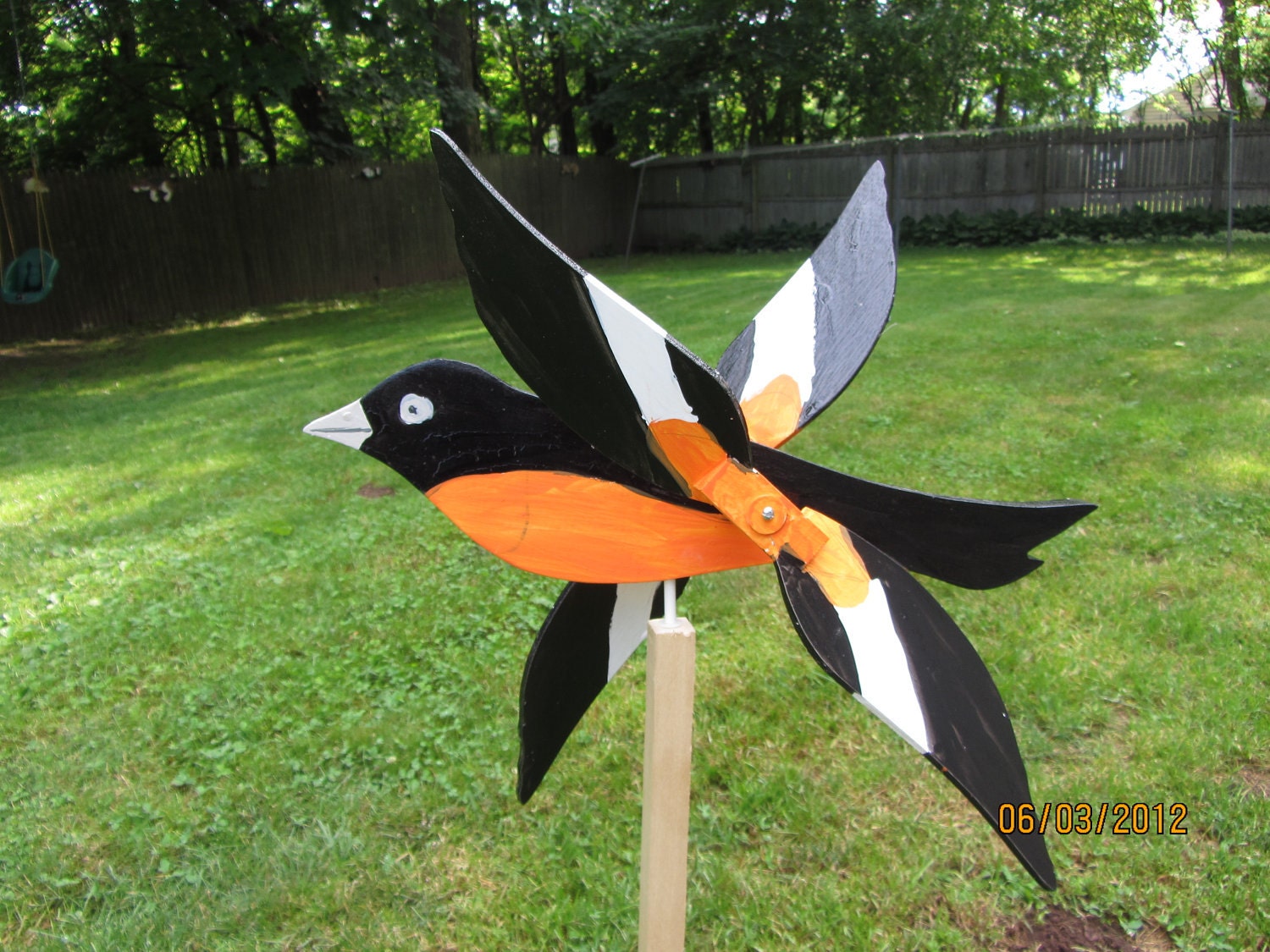 Handmade Wooden Oriole Bird shaped whirligigs for your yard