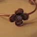 Delicate Flower Bangle Bracelet With Blue Stones