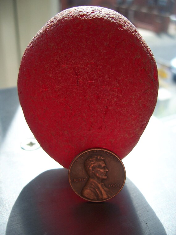 Large piece of rare red sea glass