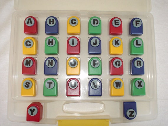 26 HALF INCH ALPHABET HOLE PUNCHES WITH CARRYING CASE EACH