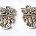 Small Antique Silver plated Owl charms. (5) Pieces
