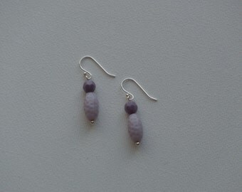 Sterling silver dangle earrings with purple dimpled vintage beads