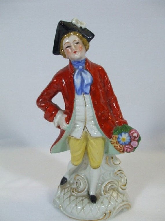 antique colonial figurines