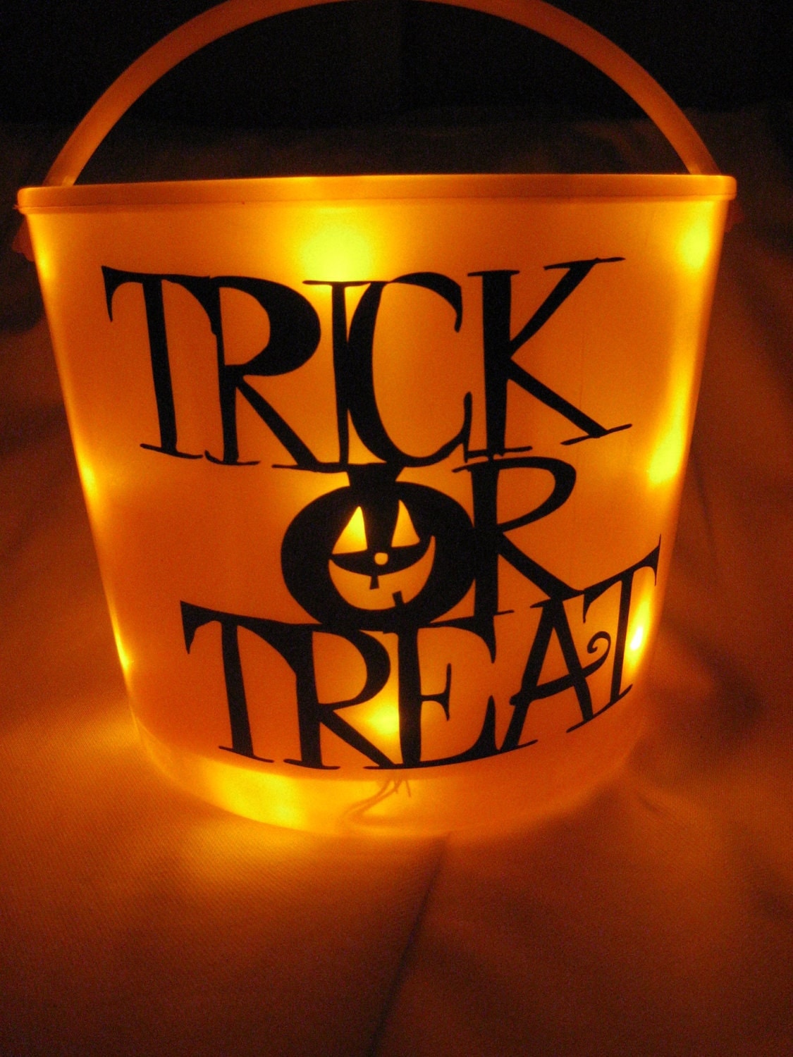 Light Up Halloween Pail
 Trick or Treat Light Up Bucket by lizziejeans on Etsy