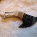 obsidian bladed knife with carved antler handle