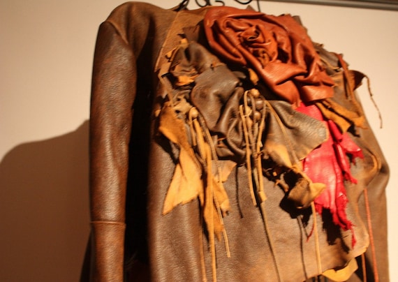 showdiva designs Distressed Leather Asymmetrical Jacket Sculpted Flowers n Fringe Ties by showdiva steampunk buy now online