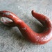 RESERVED Chippy Red Cast Iron Hook