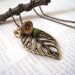 Filigree Leaf Necklace. antique brass leaf pendant with flowers