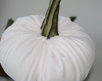 white plush pumpkin