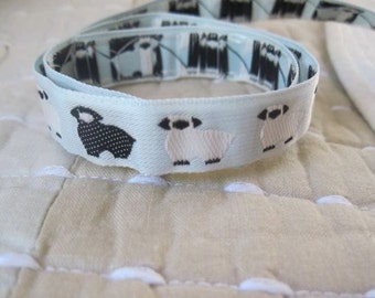 Sheep Embroidered ribbon BLACK and WHITE on ice BLUE