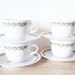 Pyrex Cups and Saucers Spring Blossom Pattern Craisy Daisy Instant Collection Green and White Christmas Decor