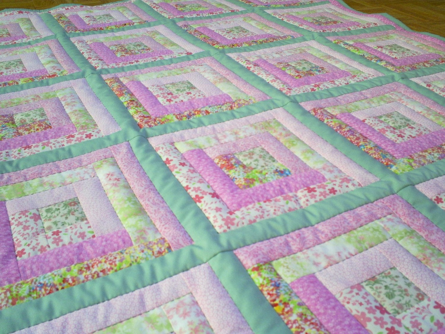 handmade-log-cabin-crib-or-lap-quilt-in-shades-of-pink-and