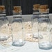 Set of 4, Clear Glass Jars with Corks, 50% off enter LOVE99 at checkout.