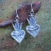 sacred flaming heart earrings....