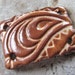 Toasted Ivory Feather Wrist Focal - Handmade Ceramic Wrist Focal