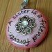 A sister is a friend forever...pink shell pendant with chain