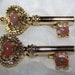 Sale was 6.00 Vintage Pair of Gerry's Key gold tone brooches with Coral Stones