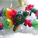 Reserved for Jude...Pygmy Parrot Chrysanthemum beadset (27) by Caroline Dousi (SRA)