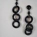 1970s vintage earrings black hoops three ring circles plastic