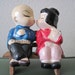On Hold vintage 60s Kissing Asian Couple SALT & PEPPER Shakers ... Scholars in Love