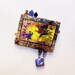 Metamorphosis Greyhound Pin