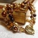 Pearl bracelet with two strands of caramel honey pearls, glass and crystals with gold